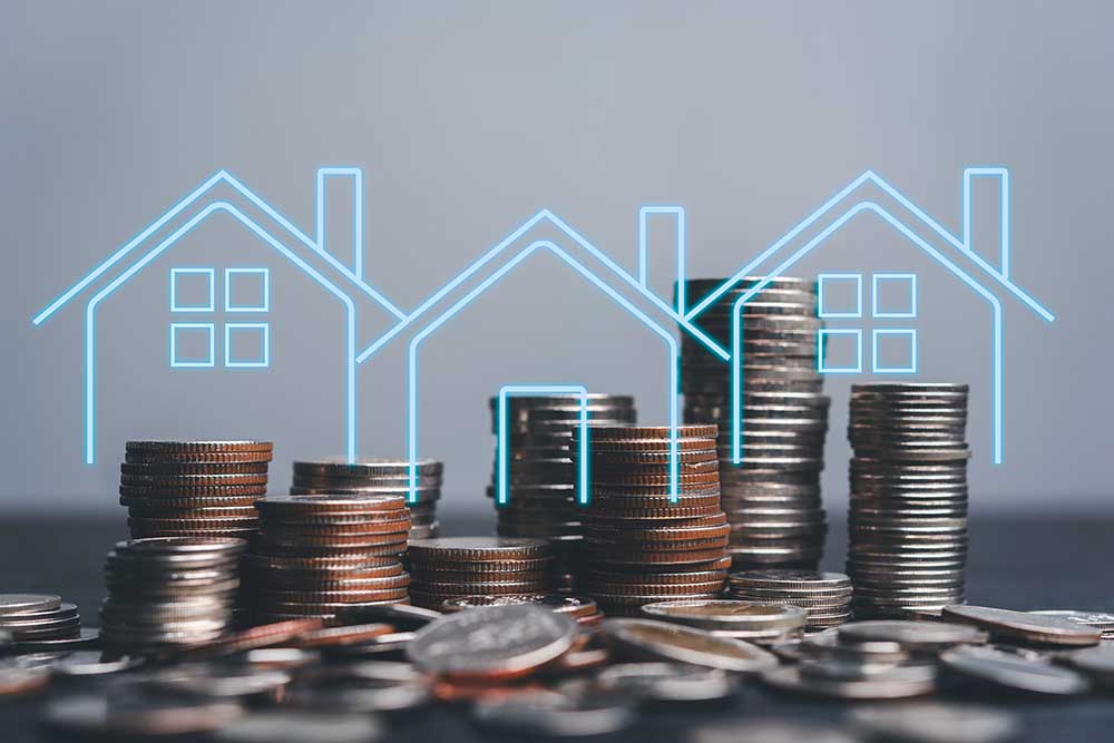 Stack of coins with digital overlay of housing market growth
